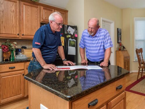 Comfort Advisor from Omni Home Comfort assisting a member with HVAC options